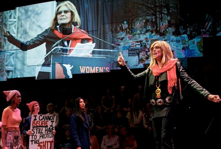 Christine Lahti in front of Gloria Steinem photo. Photo by Joan Marcus.